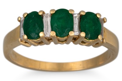 Lot 6 - AN EMERALD AND DIAMOND THREE STONE RING,...