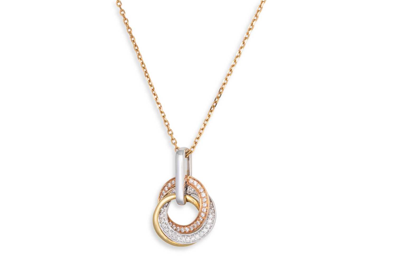 Lot 88 - A DIAMOND SET PENDANT, of swirl design,...