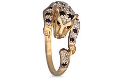 Lot 44 - A DIAMOND AND SAPPHIRE PANTHER RING, mounted...