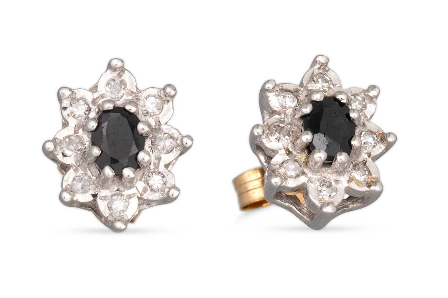 Lot 64 - A PAIR OF SAPPHIRE AND DIAMOND EARRINGS, the...