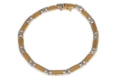 Lot 105 - A TWO TONE GOLD BRACELET, Greek key design, 11....