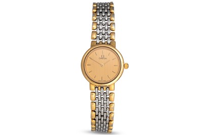 Lot 372 - A LADY'S BI-METAL OMEGA WRISTWATCH, gilt dial,...