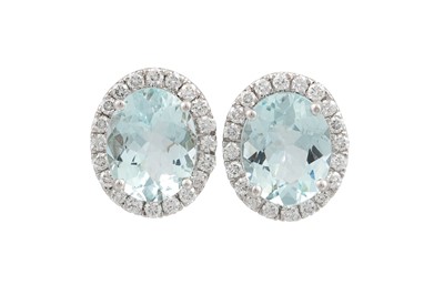 Lot 393 - A PAIR OF AQUAMARINE AND DIAMOND CLUSTER...