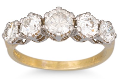 Lot 232 - A FIVE STONE DIAMOND RING, the brilliant cut...
