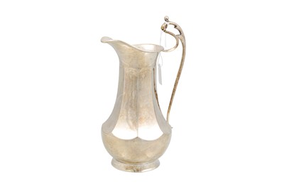 Lot 526 - A GEORGE V SILVER TALL FACETED MILK JUG, (182...