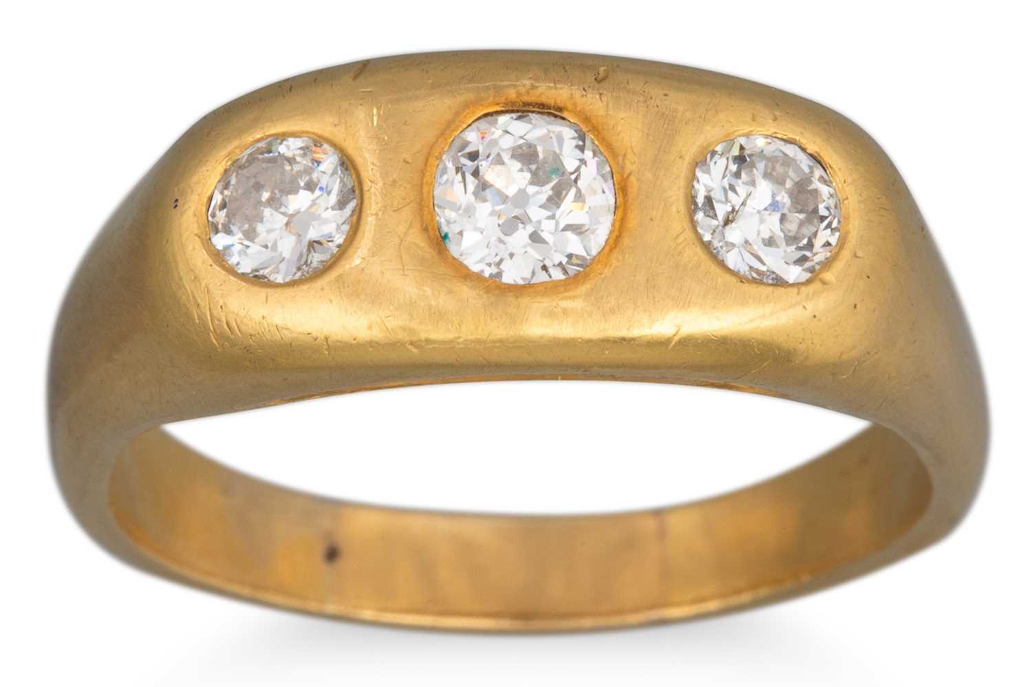 Lot 24 - A VICTORIAN THREE STONE DIAMOND RING, the old...