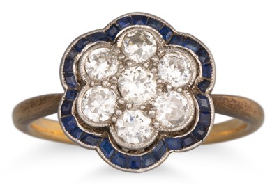 Lot 25 - AN EDWARDIAN SAPPHIRE AND DIAMOND RING, the...