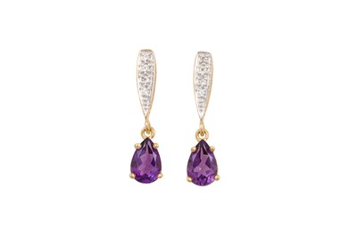 Lot 50 - A PAIR OF AMETHYST DROP EARRINGS, the shaped...