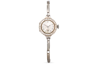 Lot 291 - A VINTAGE LADY'S DIAMOND SET WRISTWATCH,...