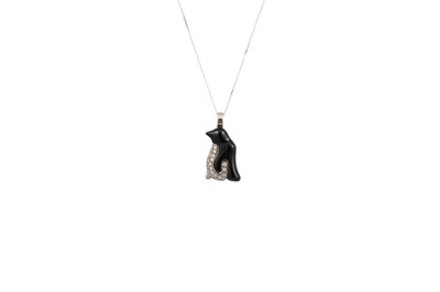 Lot 119 - A DIAMOND SET PENDANT, in the form of a...
