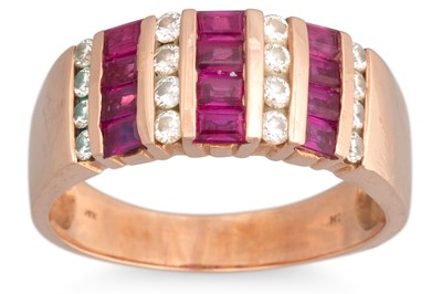 Lot 107 - A DIAMOND AND RUBY RING, alternating rows of...