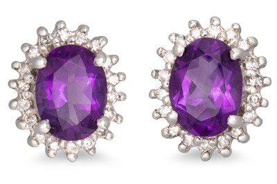 Lot 31 - A PAIR OF AMETHYST AND DIAMOND CLUSTER...