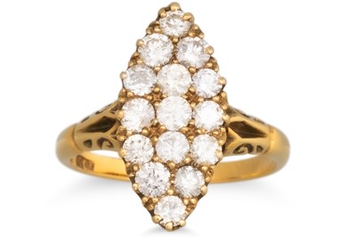 Lot 52 - A BOAT SHAPED DIAMOND CLUSTER RING, set with...