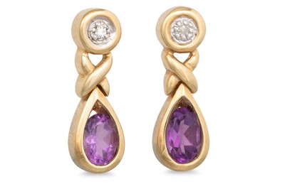 Lot 61 - A PAIR OF DIAMOND AND AMETHYST EARRINGS, the...