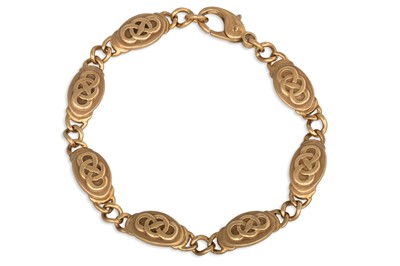 Lot 64 - A 9CT YELLOW GOLD CELTIC DESIGN BRACELET, 20 g.