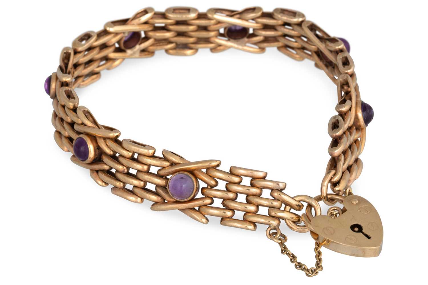 Lot 82 - AN AMETHYST SET GATE BRACELET, in 9ct yellow...