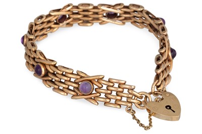 Lot 82 - AN AMETHYST SET GATE BRACELET, in 9ct yellow...