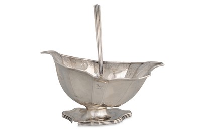 Lot 398 - A GEORGE III SILVER SWING HANDLED OPEN SUGAR...