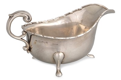 Lot 402 - A PRE-WAR SILVER HELMET SHAPED SAUCE BOAT,...