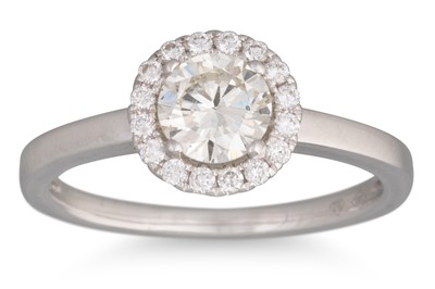 Lot 239 - A DIAMOND 'HALO' CLUSTER RING, set with...
