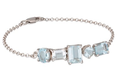 Lot 244 - AN AQUAMARINE BRACELET, the circular and...