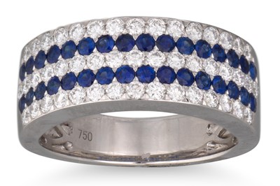 Lot 180 - A FIVE ROWED DIAMOND AND SAPPHIRE RING,...