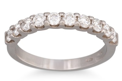 Lot 232 - A DIAMOND HALF ETERNITY RING, set with...