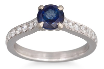 Lot 233 - A SAPPHIRE SINGLE STONE RING, with brilliant...