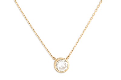 Lot 236 - A DIAMOND BEZEL SET SOLITAIRE PENDANT, mounted...