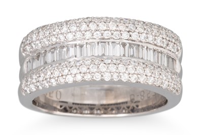 Lot 173 - A THREE ROWED DIAMOND RING, pavé set and...