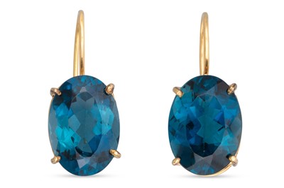 Lot 145 - A PAIR OF BLUE TOPAZ EARRINGS, mounted in...