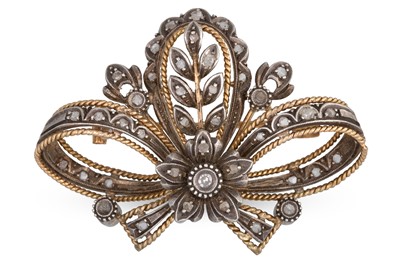 Lot 150 - A DIAMOND SET BROOCH, of scrolled form,...