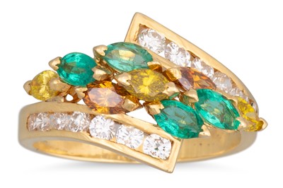 Lot 155 - AN EMERALD AND DIAMOND CROSS OVER RING,...