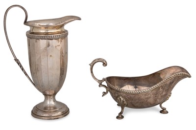 Lot 388 - A 20TH CENTURY SILVER JUG, one a George V...