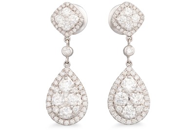 Lot 279 - A PAIR OF DIAMOND DROP EARRINGS, the pear...