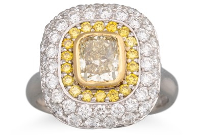 Lot 281 - A FANCY YELLOW DIAMOND RING, the centre fancy...