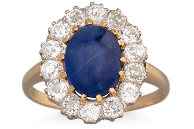 Lot 284 - A SAPPHIRE AND DIAMOND CLUSTER RING, the...