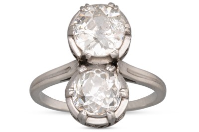 Lot 291 - A VINTAGE TWO STONE DIAMOND RING, the old cut...