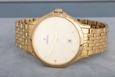 Lot 309 - A GENT'S 'FESTINA' WRISTWATCH, golden face,...