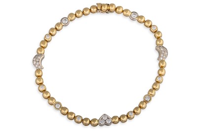 Lot 129 - A DIAMOND BRACELET, with heart and moon shaped...