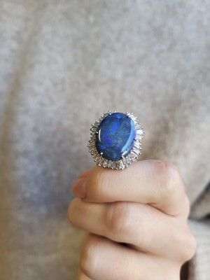 Lot 124 - A VINTAGE OPAL AND DIAMOND BROOCH/CLIP, the...