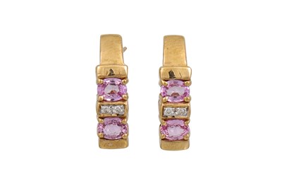 Lot 175 - A PAIR OF DIAMOND AND PINK SAPPHIRE HALF HOOP...