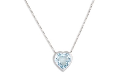 Lot 124 - A TOPAZ SET HEART SHAPED PENDANT, mounted in...