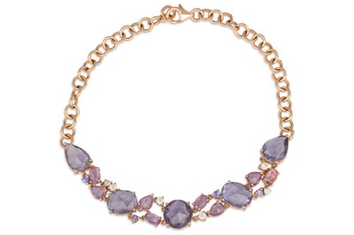 Lot 129 - A PINK SAPPHIRE AND DIAMOND ABSTRACT BRACELET,...