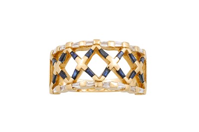 Lot 186 - A DIAMOND AND SAPPHIRE DRESS RING, of cross...
