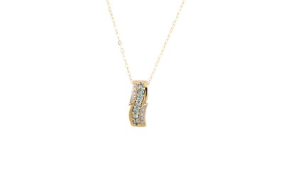 Lot 190 - A DIAMOND AND TOPAZ PENDANT, rectangular form...