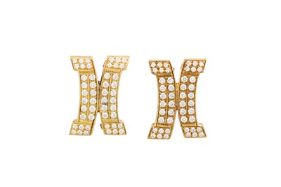 Lot 191 - A PAIR OF DIAMOND CLUSTER EARRINGS, shaped...