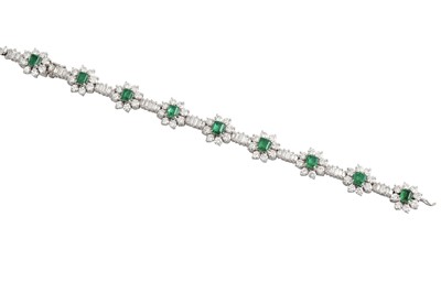 Lot 425 - AN EMERALD AND DIAMOND CLUSTER BRACELET, the...