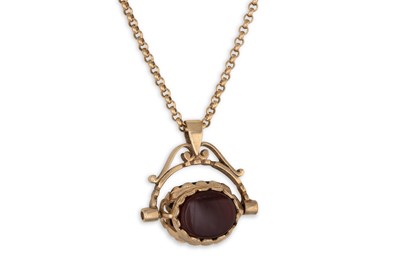 Lot 143 - A 9CT GOLD FINE CHAIN, suspending a stone set...