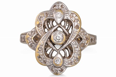 Lot 33 - A SHAPED DIAMOND CLUSTER RING, mounted in 18ct...
